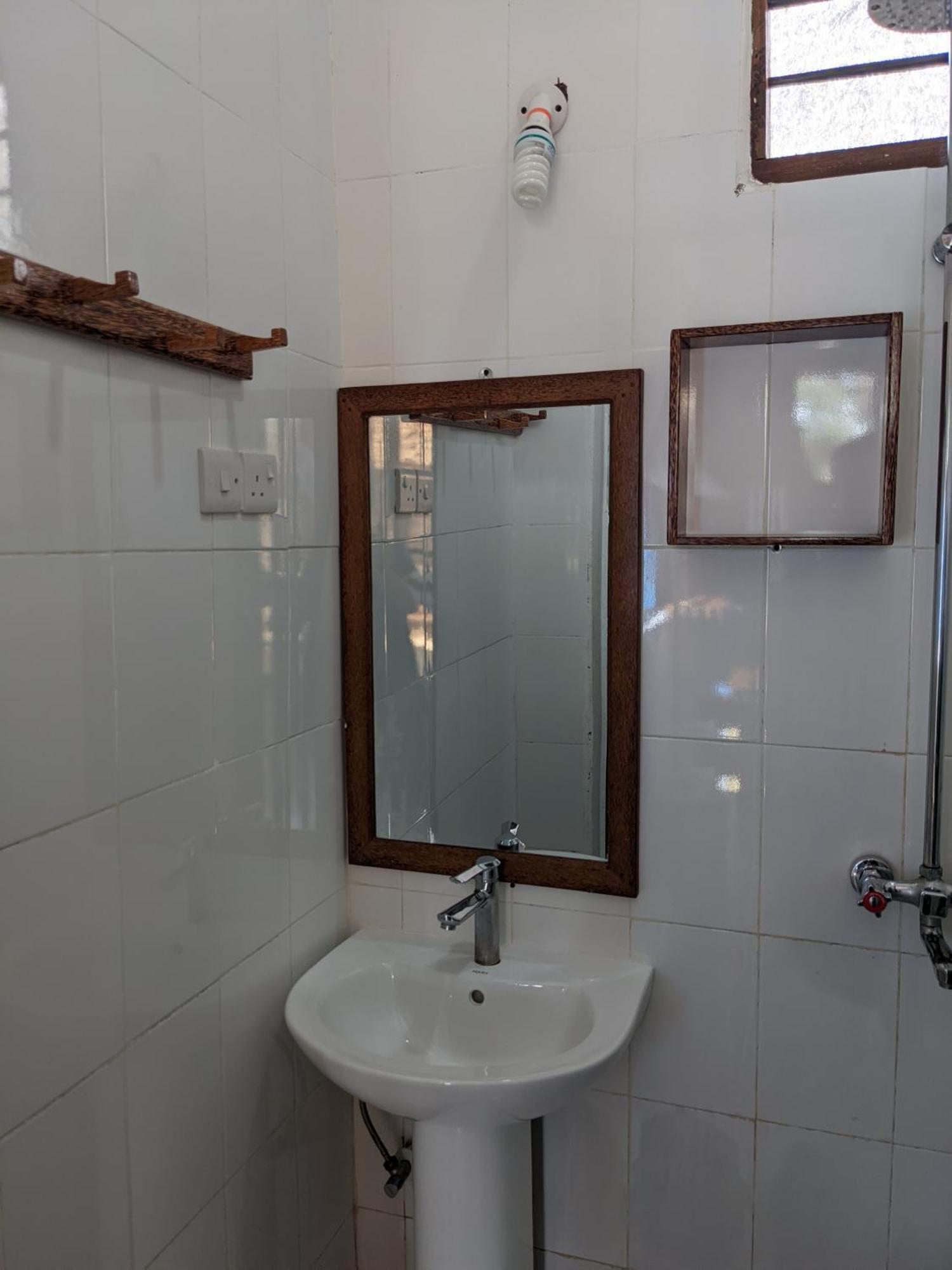 Mkadi Beach House Hotell Nungwi Rum bild