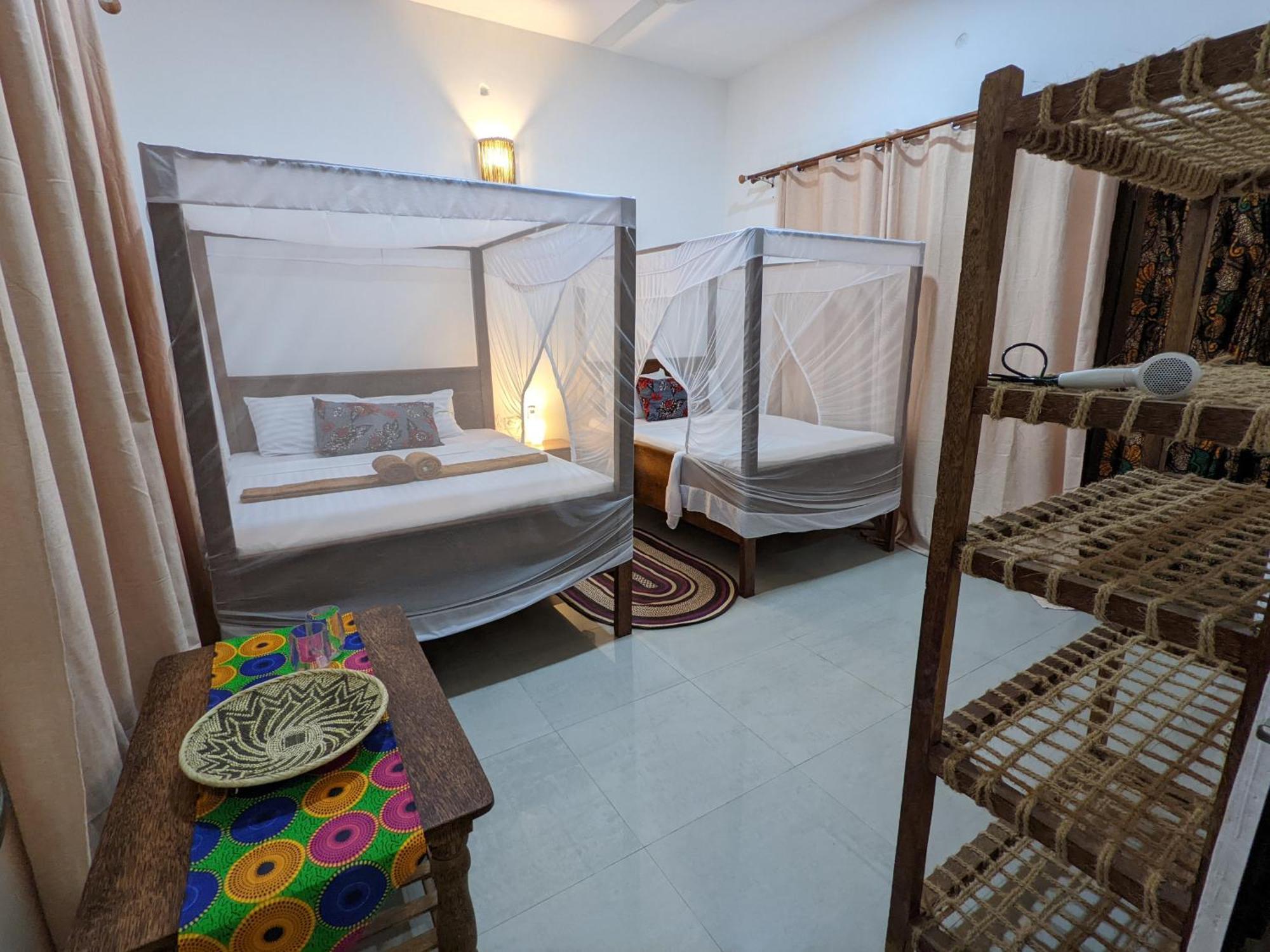 Mkadi Beach House Hotell Nungwi Rum bild